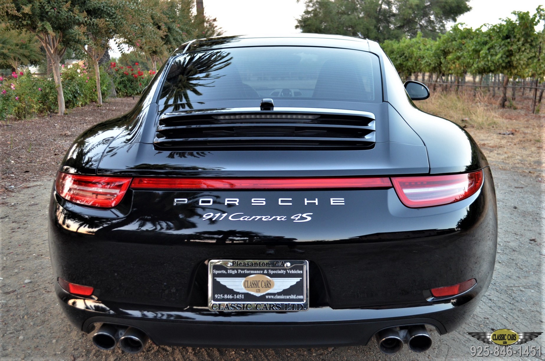 Vehicle locating services classic cars Black Porsche 911 Carrera 4S